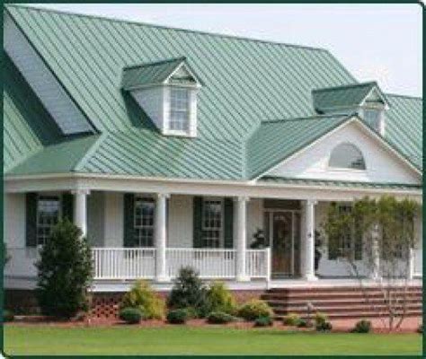 light green house with cream trim with metal roof|metal green roof colors.